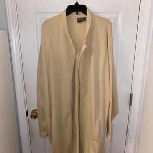 Oversized beige robe over coat